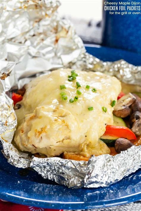 cheesy-maple-dijon-chicken-foil-packets-with-veggies image