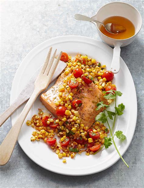 roasted-salmon-with-tomatoes-and-corn-better-homes image