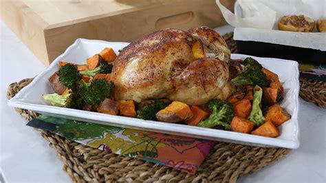 simple-roast-chicken-with-roasted-sweet-potatoes-and-broccoli image