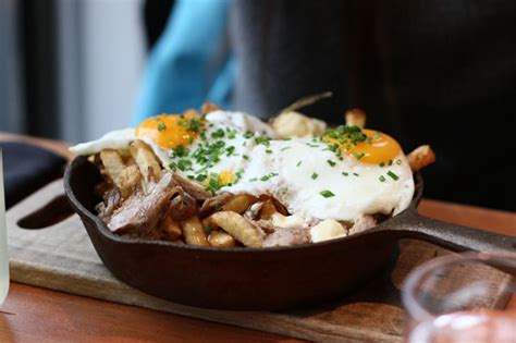 11-delicious-poutine-recipes-to-make-at-home-mental-floss image