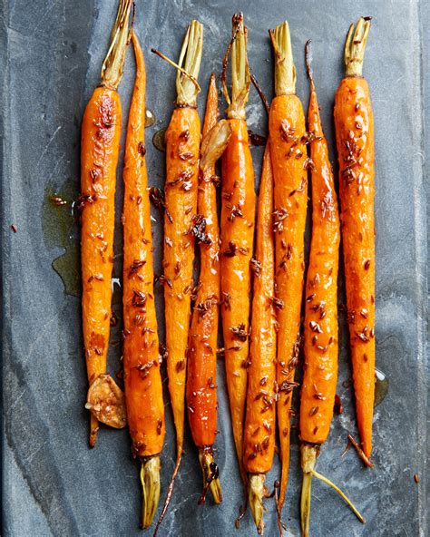 honey-cumin-roasted-carrots-better-homes-gardens image