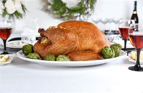 roast-turkey-with-artichoke-and-asiago-dressing image