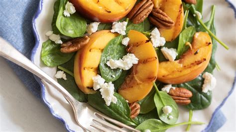 spinach-salad-with-grilled-delaware-peaches-honey image