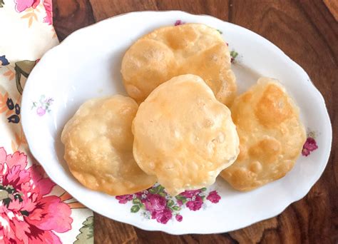 bengali-luchi-recipe-bengali-softa-maida-puffed-puri image