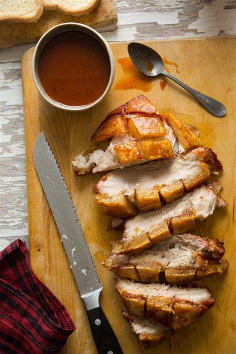crispy-grilled-pork-belly-with-a-bbq-sauce-spoon image