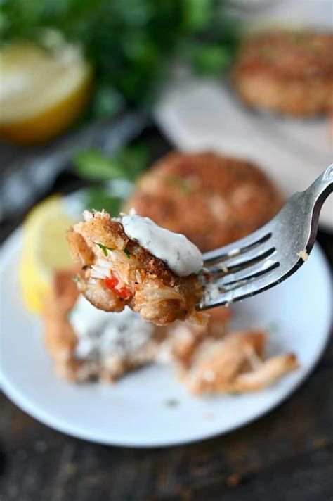 crab-cakes-with-lemon-dill-sauce-butter-your-biscuit image