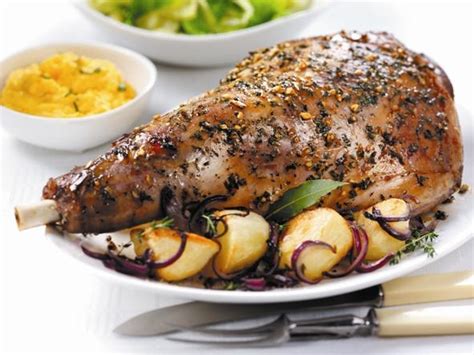 roast-leg-of-lamb-with-roasted-potatoes-food-channel image