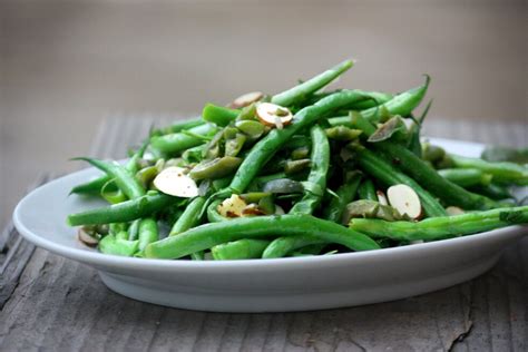 micro-steamed-green-beans-with-olives-and-almonds image