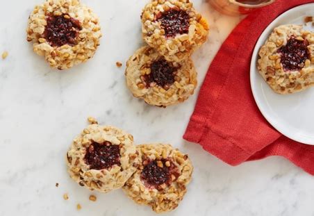 walnut-raspberry-linzer-thumbprint-cookies image