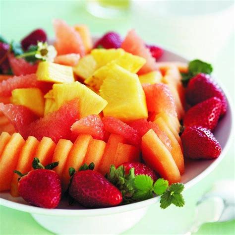 fresh-fruit-medley-with-ginger-mint-drizzle-chatelaine image