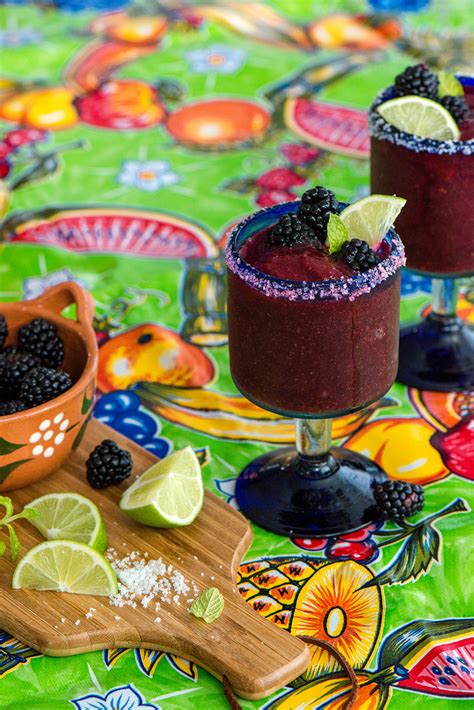 frozen-blackberry-margarita-nibbles-and-feasts image