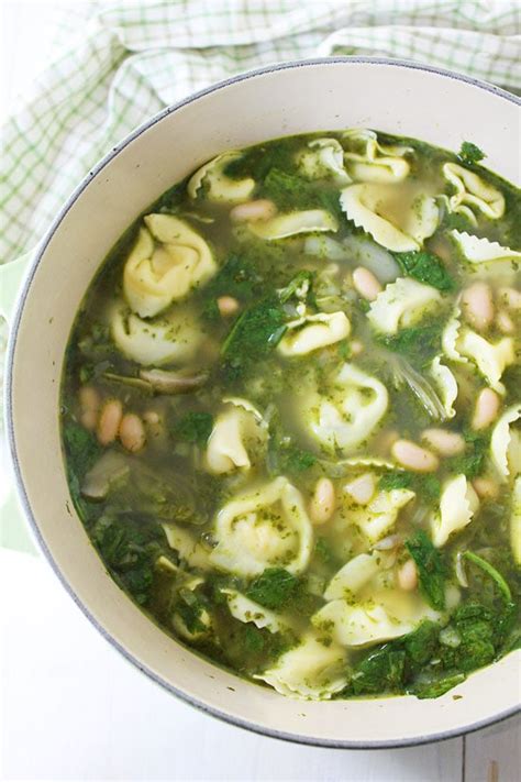 spinach-artichoke-pesto-tortellini-soup-two-peas image