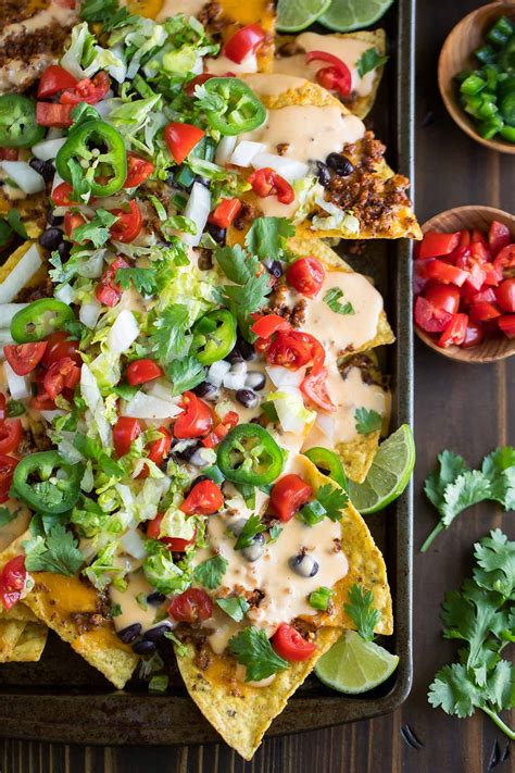 easy-sheet-pan-nachos-with-queso-peas-and-crayons image