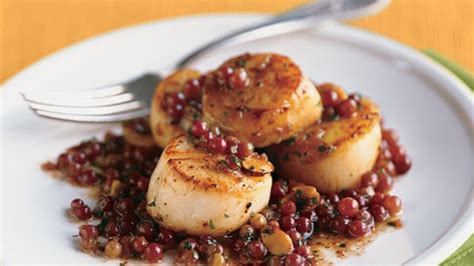 pan-seared-scallops-with-champagne-grapes-and-almonds image