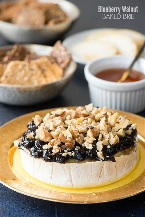 blueberry-walnut-baked-brie-with-drizzled-honey image