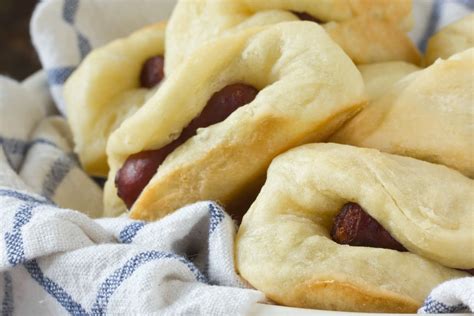 recipe-sausage-stuffed-parker-house-rolls-kitchn image