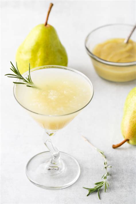 sparkling-rosemary-pear-martini-eats-by-the-beach image