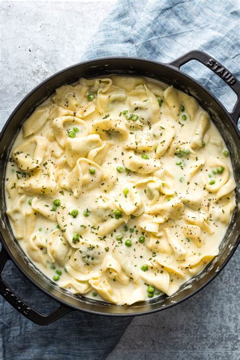creamy-tortellini-alfredo-with-peas-nourish-and-fete image