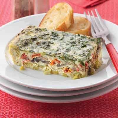 baked-eggs-with-leeks-sun-dried-tomatoes-land image