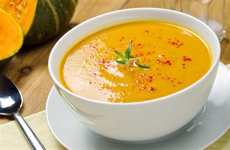 roasted-squash-and-garlic-soup-with-beet-splash image