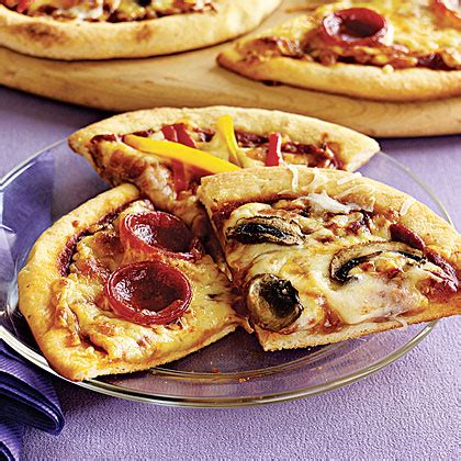individual-pizzas-recipe-myrecipes image