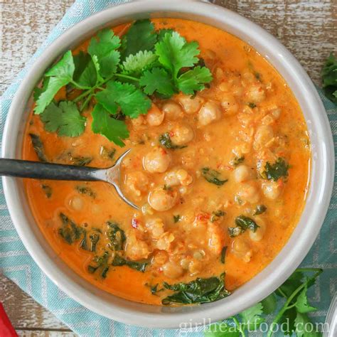 curried-red-lentil-soup-with-chickpeas-and-kale-girl image