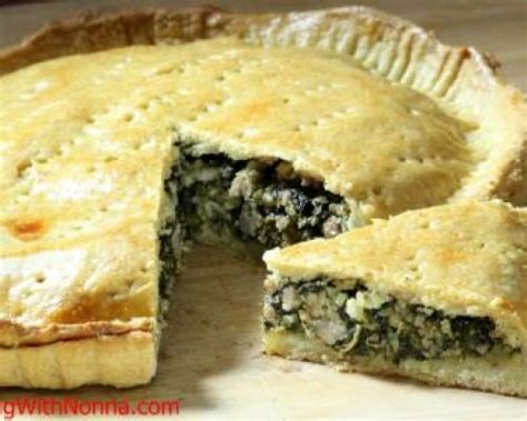 broccoli-rabe-and-sausage-pie-cooking-with-nonna image