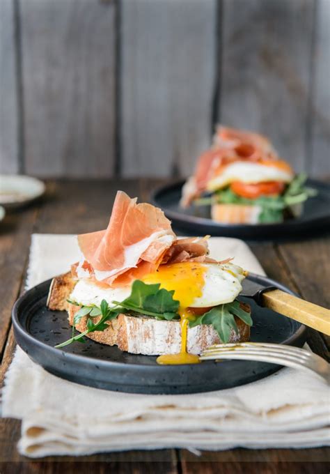 prosciutto-and-eggs-open-faced-breakfast-sandwich image