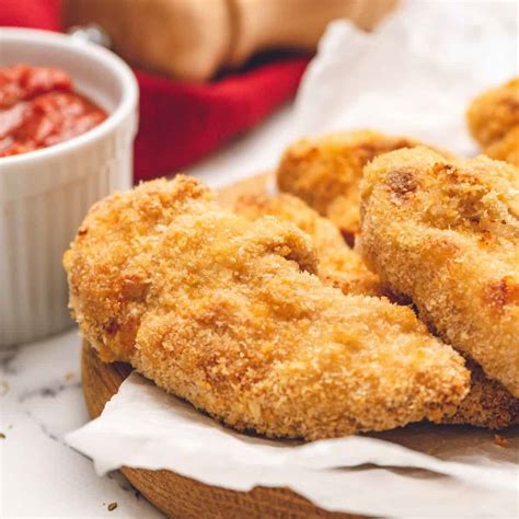 the-best-baked-chicken-tenders-recipe-a-mind-full image