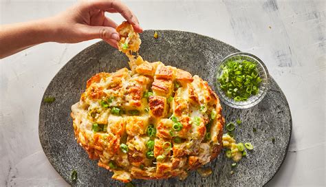 cheesy-chile-pull-apart-bread-recipe-real-simple image