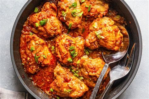 smothered-chicken-thighs-in-onion-gravy image