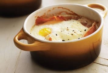 baked-eggs-with-prosciutto-and-asiago-cream-brunch image