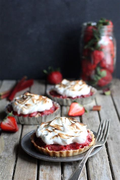 strawberry-rhubarb-meringue-tartlets-completely-delicious image
