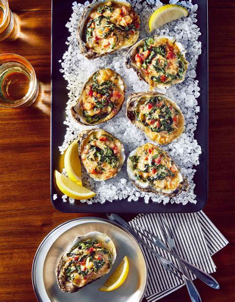 baked-oysters-with-bacon-greens-and-parmesan image