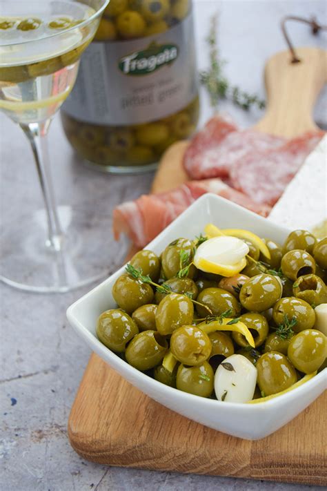 gin-marinated-olives-a-simple-boozy-party-food-idea image