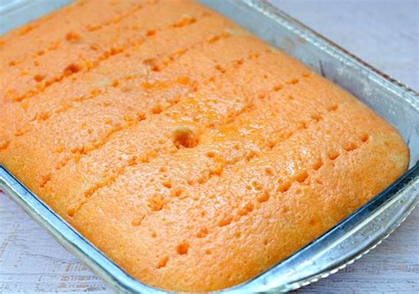 pumpkin-patch-orange-poke-cake-recipe-growing image
