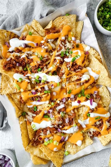 the-best-chili-con-carne-nachos-get-on-my-plate image