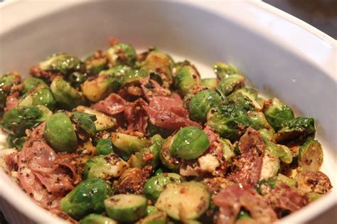 cheesy-garlicky-brussels-sprouts-with-prosciutto image
