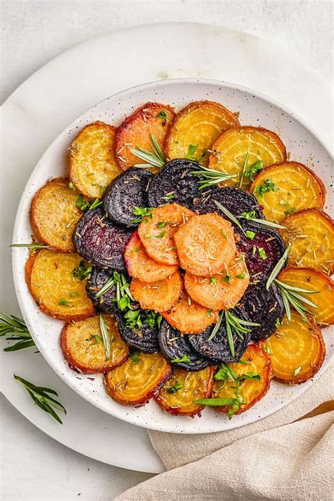 rosemary-roasted-beets-and-carrots-the-yummy-bowl image
