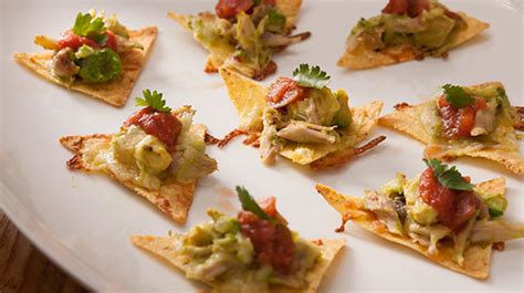 tortilla-chips-baked-with-chicken-avocado-and-cheese image