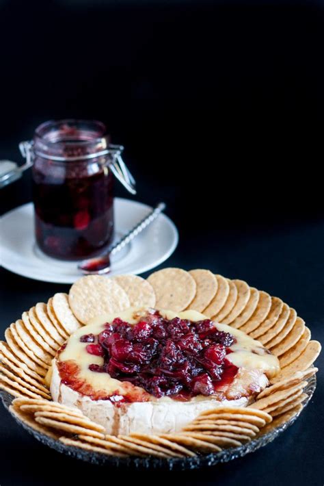 baked-brie-with-fresh-cranberries-goodie-godmother image