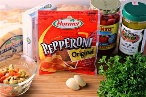 hot-pepperoni-muffuletta-dip-renees-kitchen-adventures image