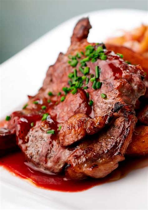 oven-baked-cajun-pork-steaks-recipe-flavorite image