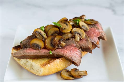 open-face-steak-sandwich-with-sauteed-mushrooms image