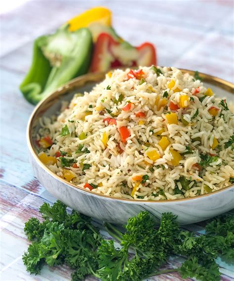 bell-pepper-parsley-rice-recipe-archanas-kitchen image