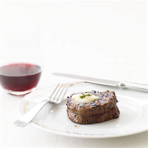 peppered-beef-tenderloin-with-roasted-garlic-herb-butter image