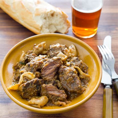 catalan-style-beef-stew-with-mushrooms-cooks image