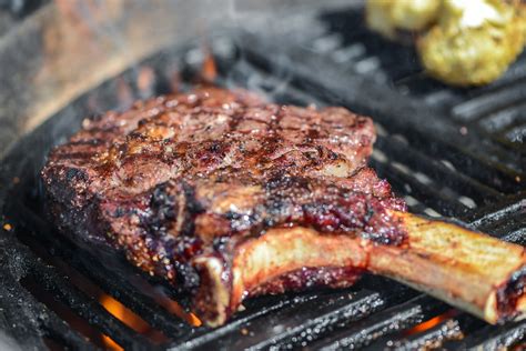 how-to-grill-perfect-cowboy-bone-in-ribeye-steaks image
