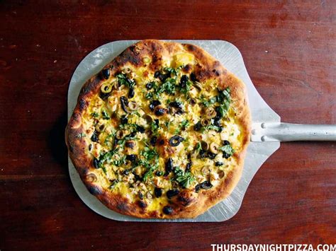 moroccan-inspired-pizza-with-preserved-lemon image