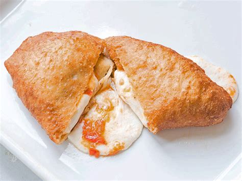 fresh-tomato-and-mozzarella-panzerotti-saveur image